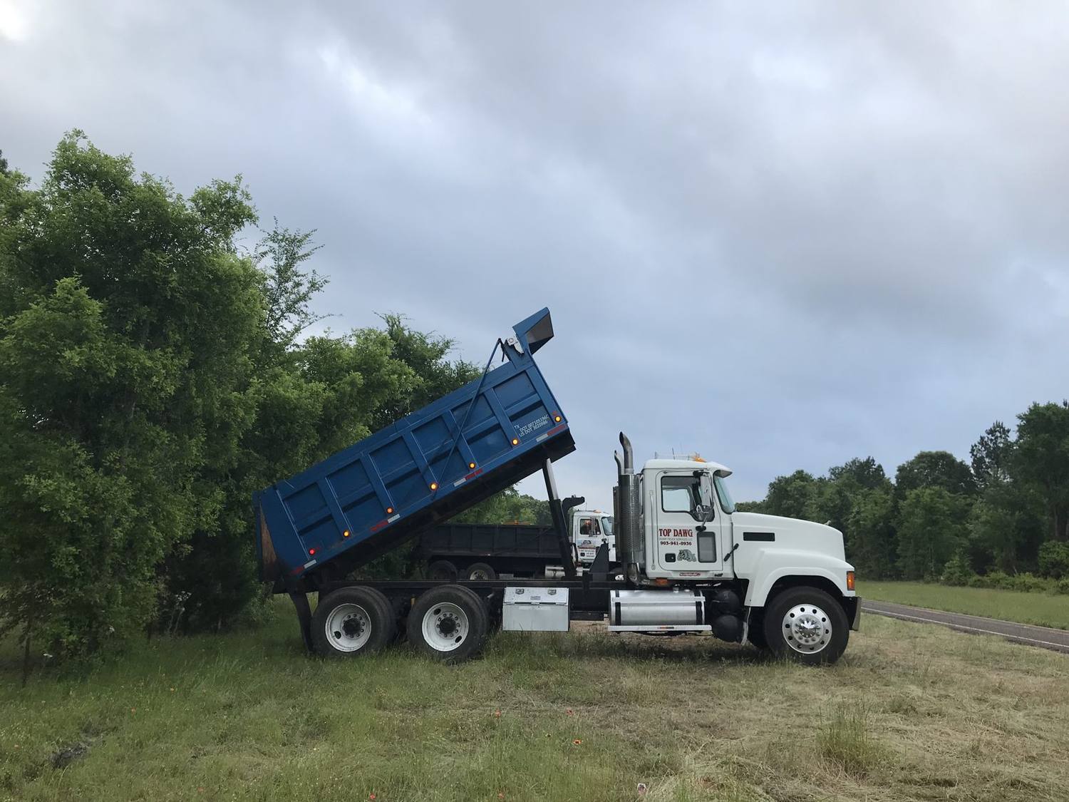 Top Dawg dump truck on a job site